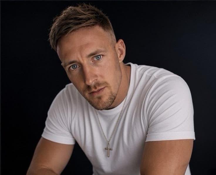 Studio portrait of JAENOX on black background