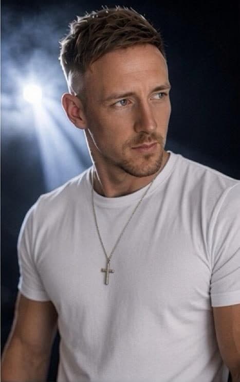 JAENOX studio portrait in a dramatic spotlight